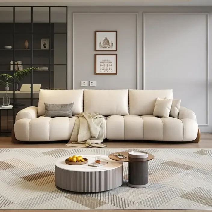 Italian Curved Cream-Colored Leather Sofa