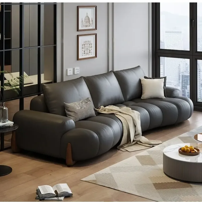Globe Furnishings - Italian Curved Cream-Colored Leather Sofa Globe Furnishings - Italian Curved Cream-Colored Leather Sofa