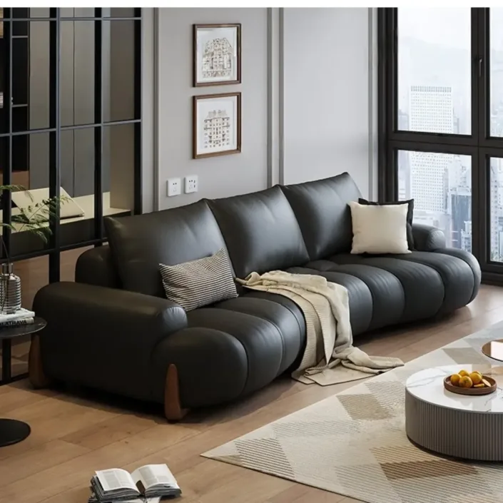 Globe Furnishings - Italian Curved Cream-Colored Leather Sofa Globe Furnishings - Italian Curved Cream-Colored Leather Sofa